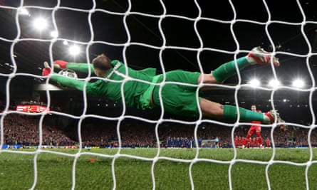 Gianluigi Donnarumma stops a penalty for PSG in the Champions League knockout round