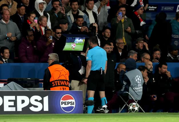 Vitinha prepares to take a crucial penalty kick against Arsenal