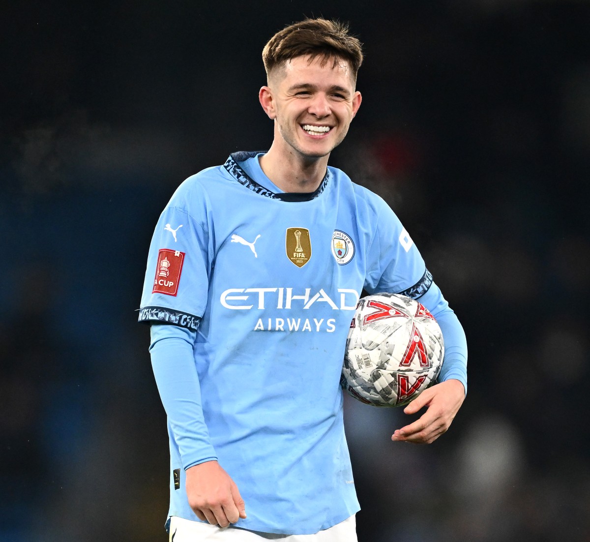 James McAtee in action for Manchester City