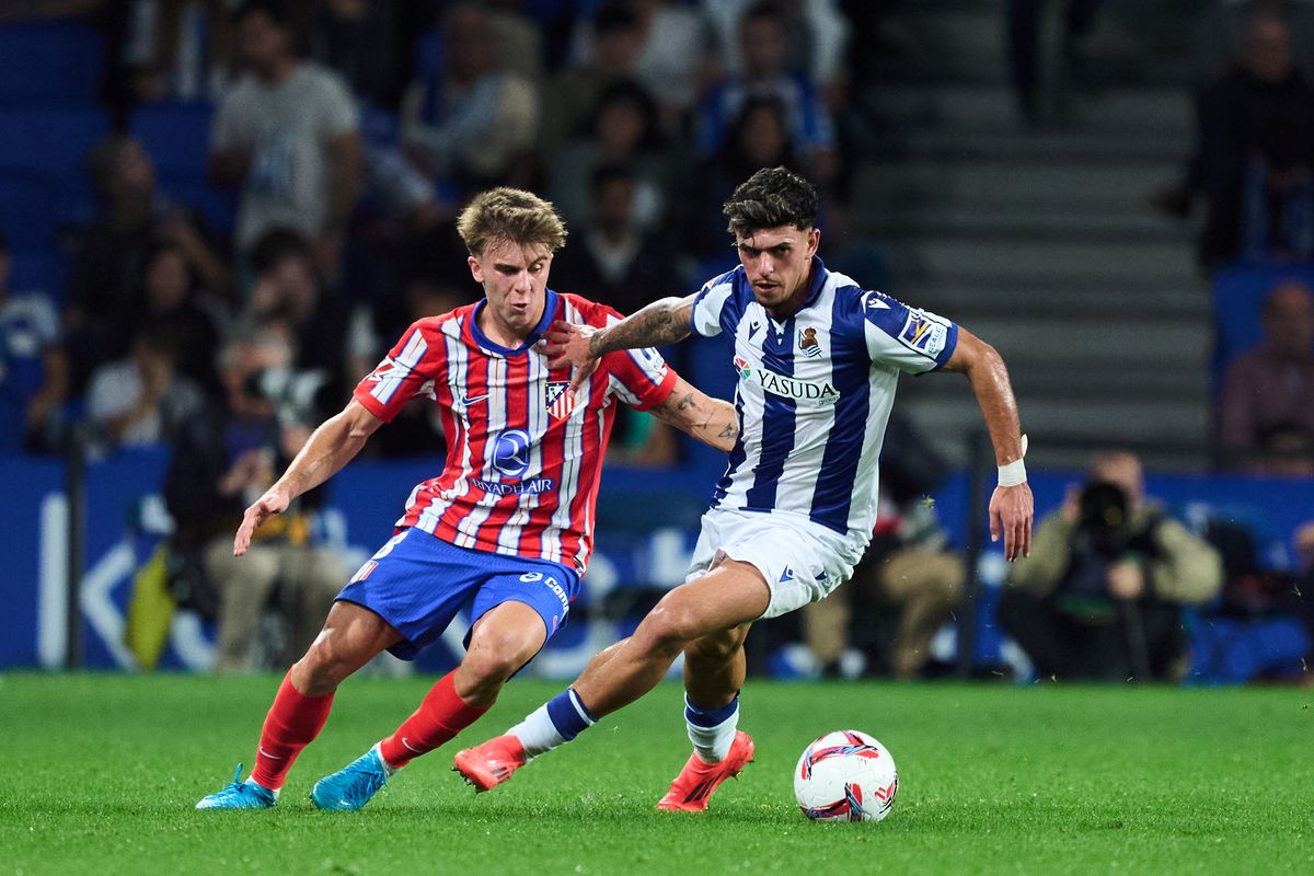 Atletico Madrid players in action against Osasuna