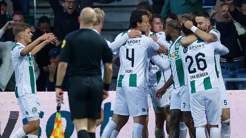Ajax FC players react during a tense Eredivisie match