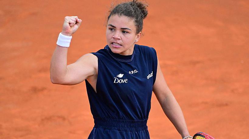 Jasmine Paolini returns a shot during the Italian Open
