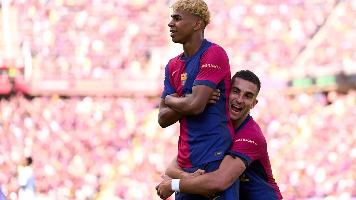 Aficionados celebrando un título de Barcelona FC en el Camp Nou