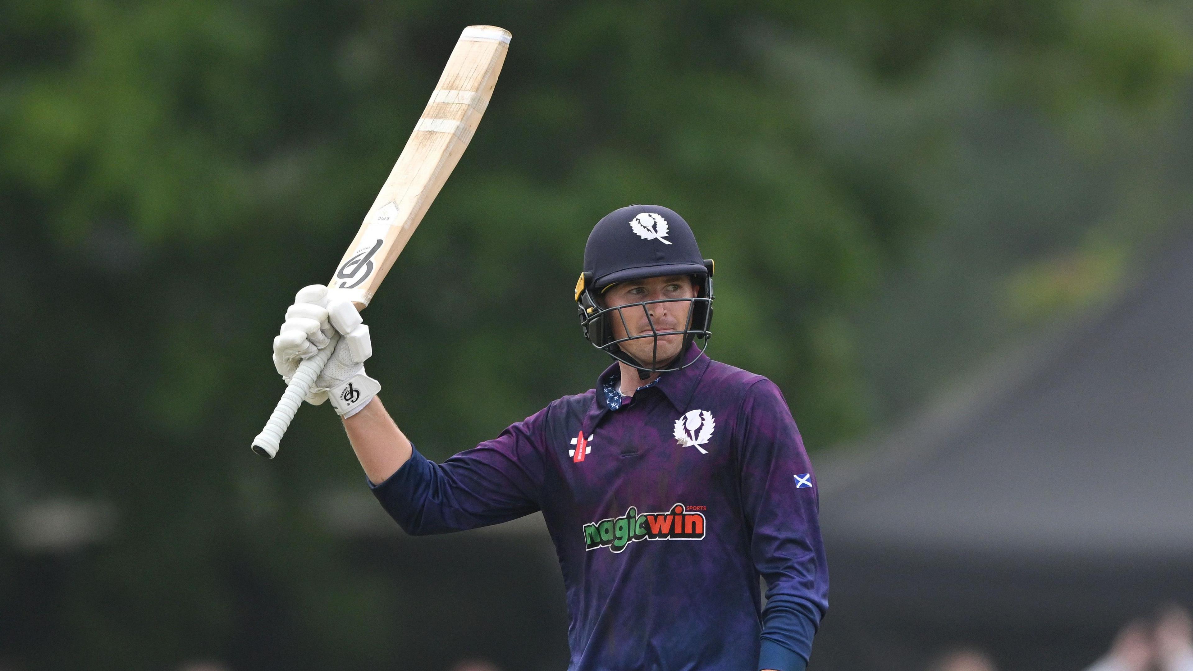 Brandon McMullen celebrates a milestone in ODI cricket