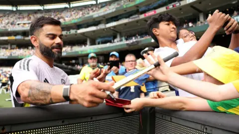 Indian and English cricketers in action during an ind vs eng match