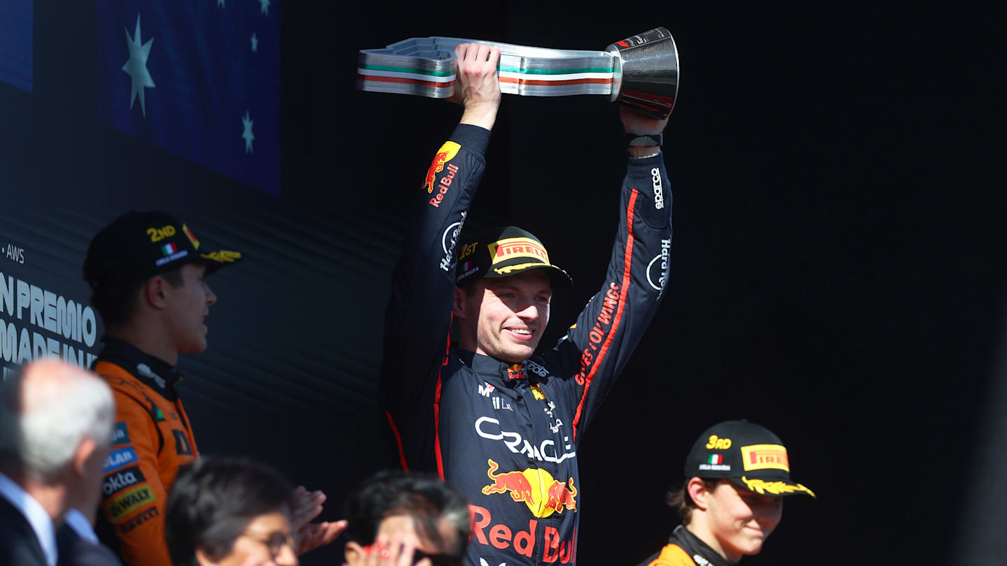 Max Verstappen celebrates win at Imola, impacting f1 standings